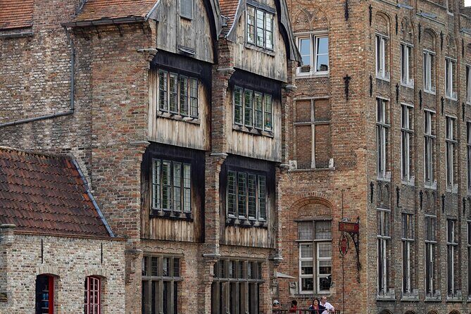 2-Hour Historical Walking Tour in Bruges with Praline Included - De Halve Maan and Boniface Bridge: industry details with romance