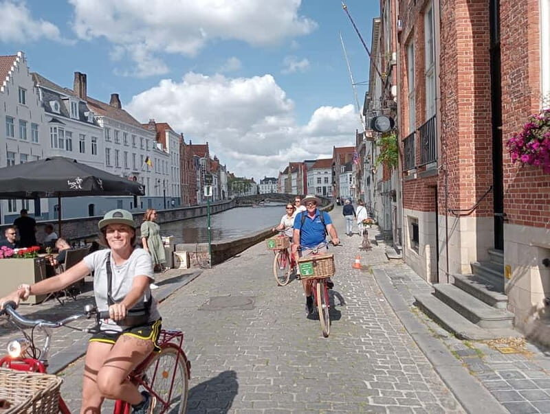 Bruges: Guided Retro Bike Tour of Highlights and Hidden Gems - Dijver and the Sint-Anna Quarter: scenic riding, not just stopping