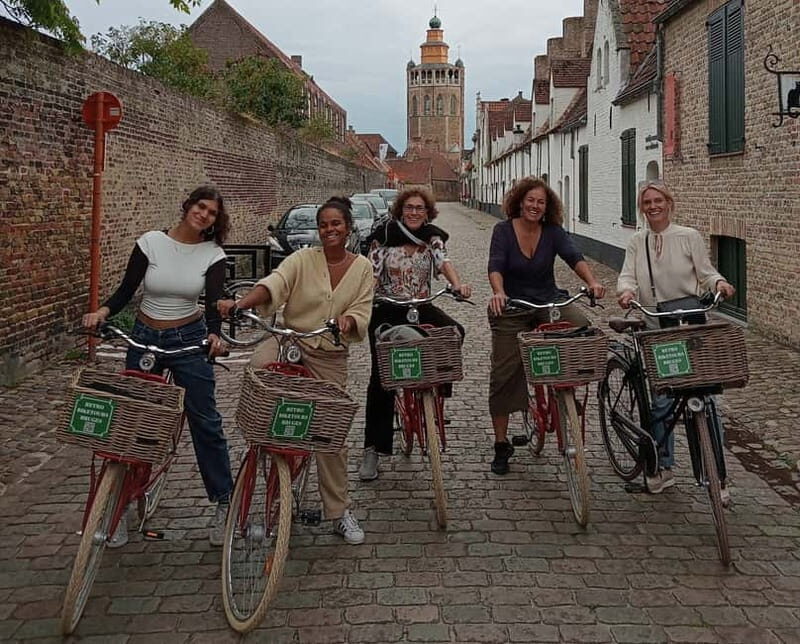 Bruges: Guided Retro Bike Tour of Highlights and Hidden Gems - Minnewater (Lake of Love), windmills, canals, and bridges