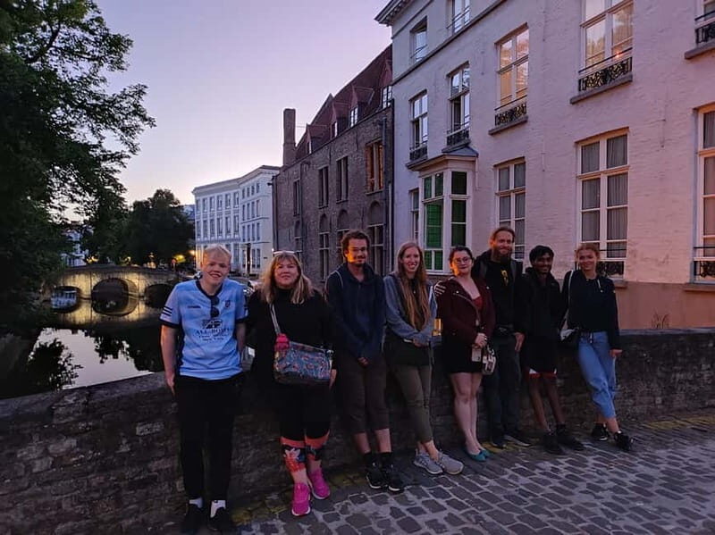 Bruges: Nightly Tales and Untold History Walking Tour - Kraanplein and Huis Ter Beurze: canals, commerce, and character