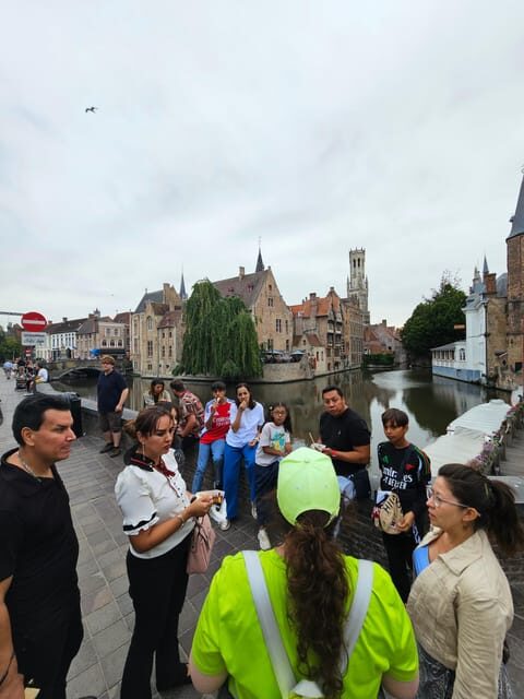 Bruges: Walking Tour with Hot Chocolate & Chocolate Tasting - Dijver and Church of Our Lady: stories in stone