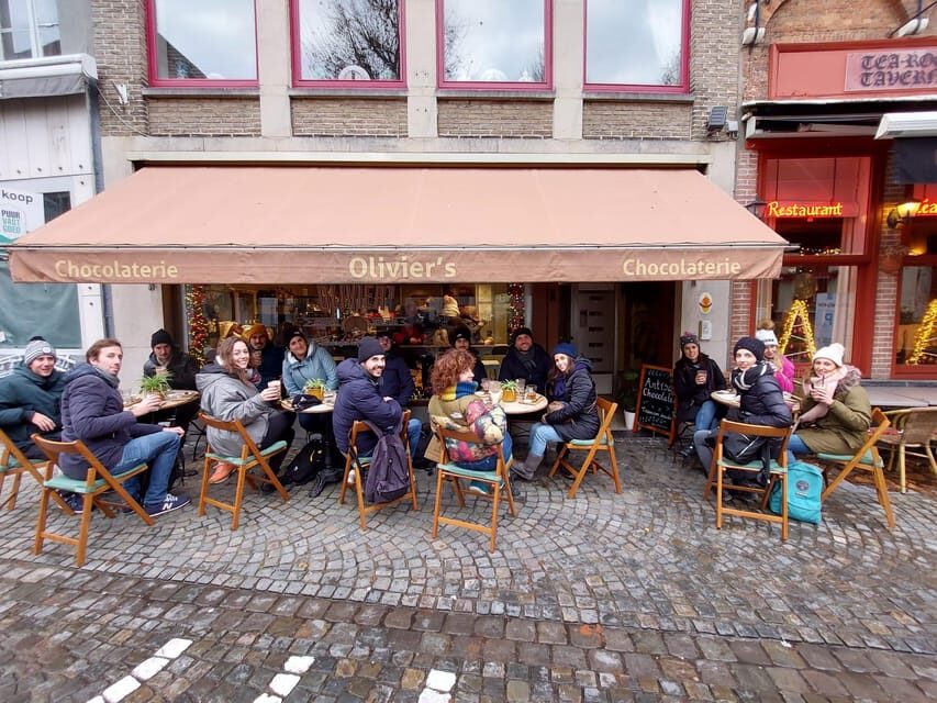 Bruges: Walking Tour with Hot Chocolate & Chocolate Tasting - Markt to Burg Square: a fast orientation through Bruges icons
