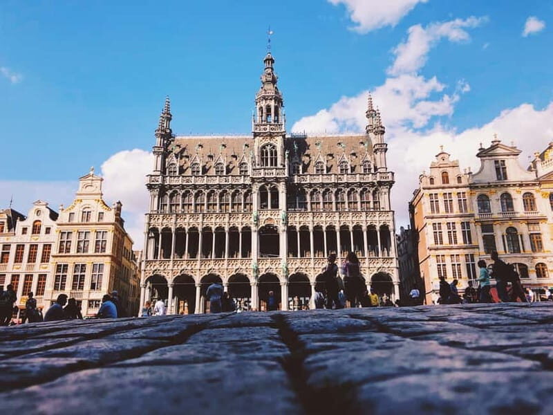 Brussels Highlights: Walking & Bus Tour with Waffle Tasting - Walking the Grand Place: Architecture You Can Actually See
