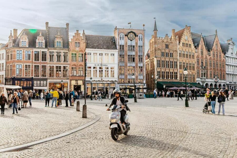 From Amsterdam: Day Trip to the Charming Brussels and Bruges - Getting to the day: meeting point, coach comfort, and transfer timing