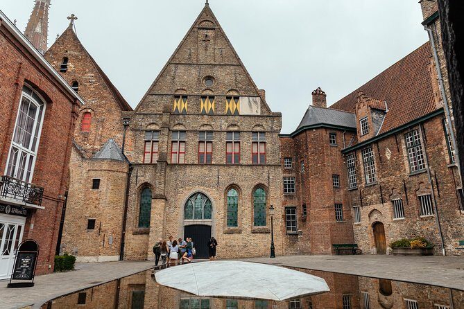 Highlights & Hidden Gems With Locals: Best of Bruges Private Tour - Canal stroll to the oldest bridge: history you can see