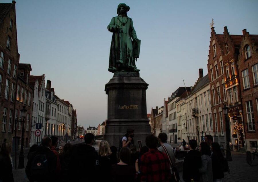 Night Tour: The Dark Side of Bruges - by Legends - Starting at Grote Markt with a red umbrella